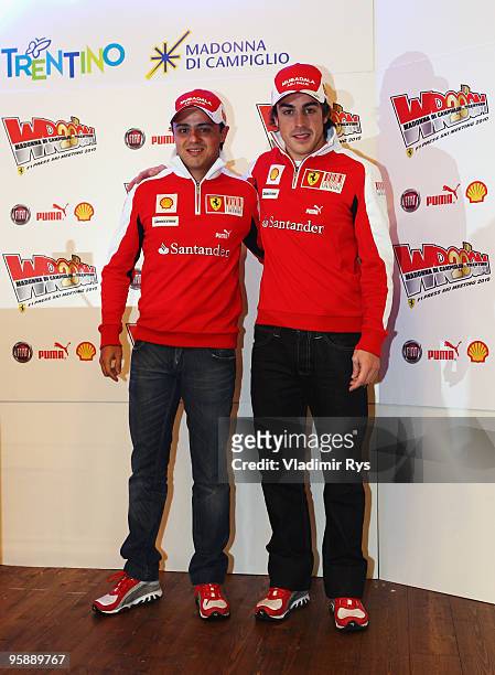 Fernando Alonso of Spain and his team mate Felipe Massa of Brazil and Ferrari pose for a photo at a press conference during the Wroom 2010 on January...