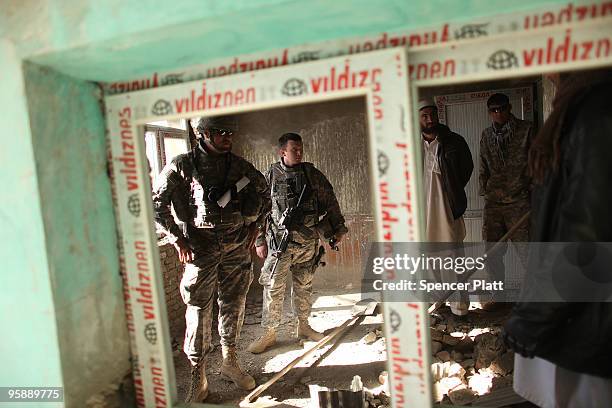 Members of a Provincial Reconstruction Team and the 3509 Maneuvers unit inspect a hospital they are overseeing and financing on January 20, 2010 in...