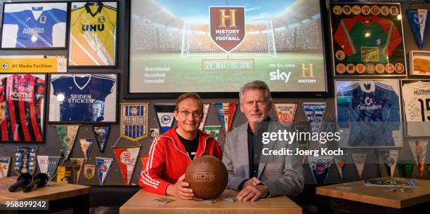 Host Wigald Boning and football legend Paul Breitner attend the preview screening of the new documentaries 'Deutschland - Deine Fussballseele' and...