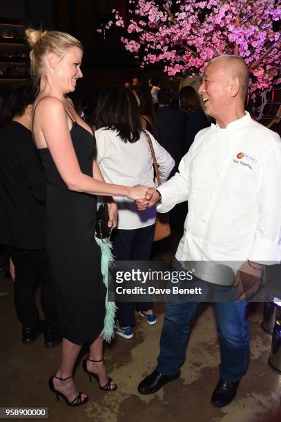Lara Stone is greeted by Nobu Matsuhisa at the Nobu Hotel London Shoreditch official launch event on May 15, 2018 in London, United Kingdom.
