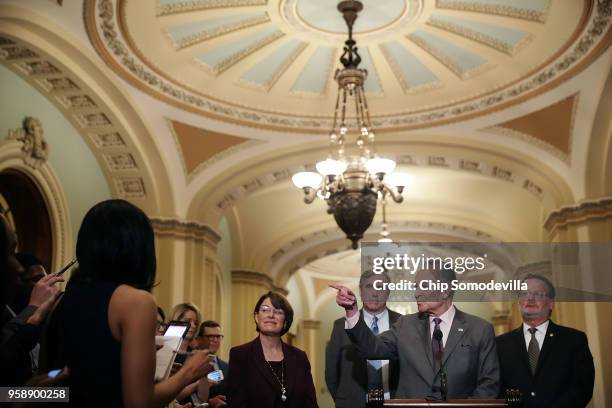 Senate Minority Leader Charles Schumer calls on reporters following the weekly Senate Democratic policy luncheon with Sen. Amy Klbuchar , Sen. Jeff...