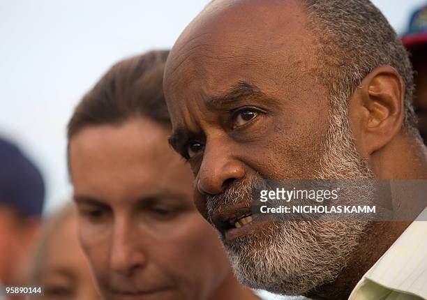 Haitian President Rene Preval speaks to the press after meeting with US Secretary of State Hillary Clinton at Port-au-Proince Toussaint Louverture...
