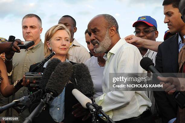 Haitian President Rene Preval speaks to the press with US Secretary of State Hillary Clinton after their meeting at Port-au-Prince's Toussaint...