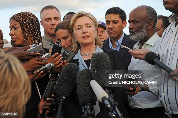 Secretary of State Hillary Clinton speaks to the press with Haitian President Rene Preval after their meeting at Port-au-Prince's Toussaint...