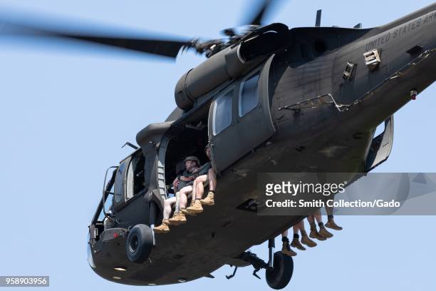 5th Ranger Training Battalion paratroopers preparing to jump out of a UH-60 Blackhawk Helicopter, Camp Merrill, Dahlonega, Georgia, May 9, 2018....
