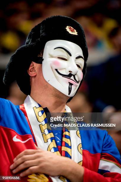 Fan of Russia wears a mask during the group A match Russia v Sweden of the 2018 IIHF Ice Hockey World Championship at the Royal Arena in Copenhagen,...