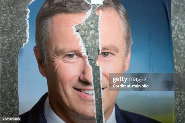 April 23, 2017 - Henin Beaumont, Nord, France. A poster of presidential candidate Dupont Aignant was damaged by bystanders. French nationals are...