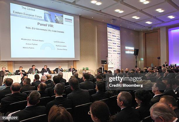 Visitors attend a panel discussion at the Euromoney Central Eastern European Forum in Vienna, Austria, on Wednesday, Jan. 20, 2010. The meeting of...