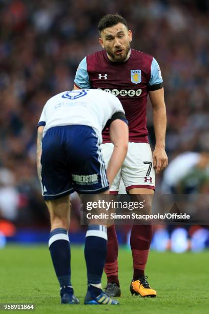 Robert Snodgrass of Villa apologises to Adam Clayton of Boro during the Sky Bet Championship Play Off Semi Final Second Leg match between Aston Villa...