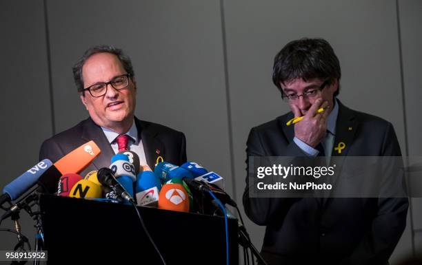 New elected and former Catalan Prime Minister Qim Torra and Carles Puigdemont hold a press conference in Berlin, Germany on May 15, 2018.