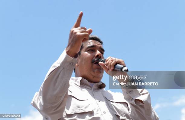 Venezuelan President Nicolas Maduro delivers a speech during a campaign rally in Charallave, about 65 km from Caracas, on May 15, 2018. Venezuela...