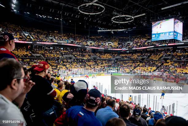 Fans follow the group A match Russia v Sweden of the 2018 IIHF Ice Hockey World Championship at the Royal Arena in Copenhagen, Denmark, on May 15,...