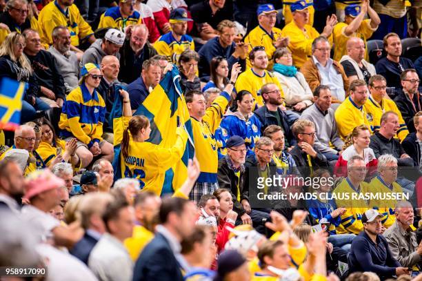 Sweden fans cheer during the group A match Russia v Sweden of the 2018 IIHF Ice Hockey World Championship at the Royal Arena in Copenhagen, Denmark,...