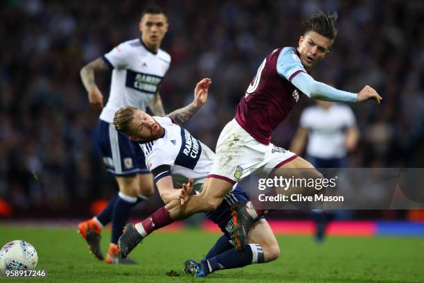 Adam Clayton of Middlesbrough collides with Jack Grealish of Aston Villa during the Sky Bet Championship Play Off Semi Final second leg match between...