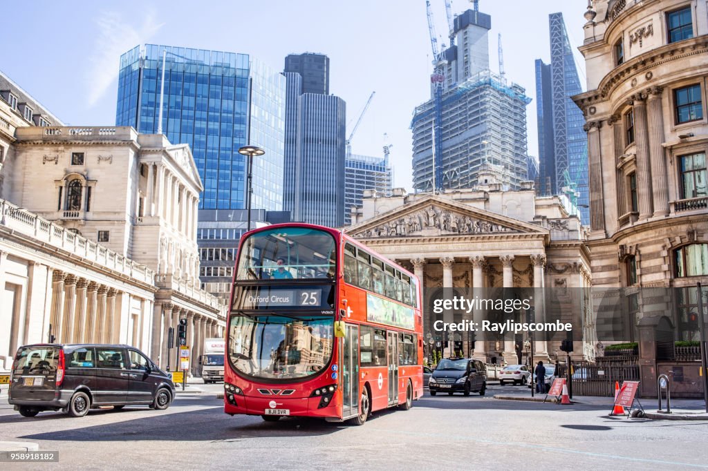 View looking towards Threadneedle St where the The Bank of England is situated. The modern architecture in the background contrasting with the older Georgian architecture