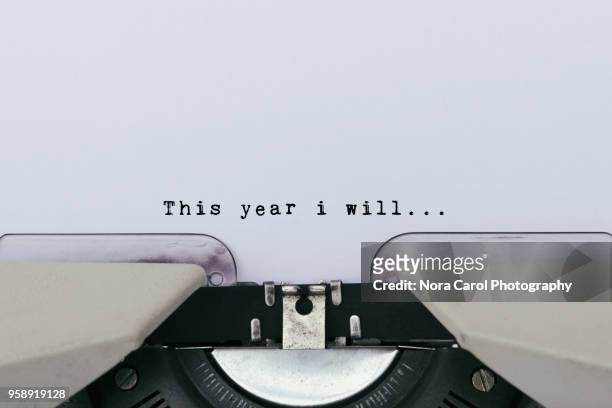 this year i will text on a vintage typewriter - determination imagens e fotografias de stock