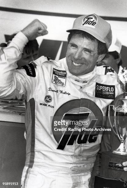 Darrell Waltrip celebrates in Victory Lane after winning the Daytona 500. Waltrip would take home $184,000 for the win.