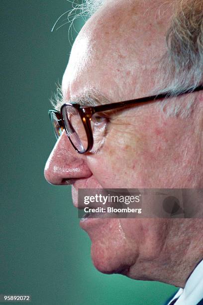 Warren Buffett, chairman and chief executive officer of Berkshire Hathaway Inc., speaks during a television interview before a special shareholders...