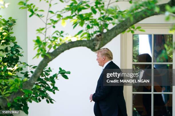 President Donald Trump departs the White House in Washington, DC, on May 15, 2018. - Trump is traveling to Walter Reed National Military Medical...