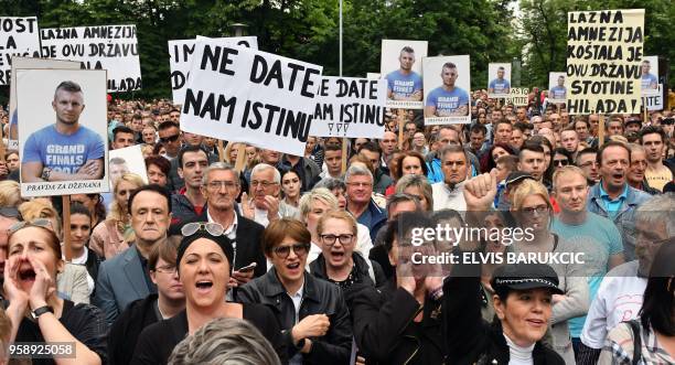Citizens of Sarajevo and Banja Luka gather in a joint protest in Sarajevo on May 15 seeking justice in two criminal cases that happened two years ago...