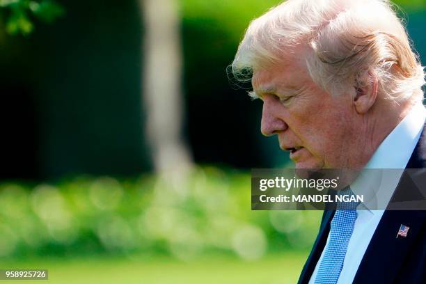 President Donald Trump departs the White House in Washington, DC, on May 15, 2018. - Trump is traveling to Walter Reed National Military Medical...