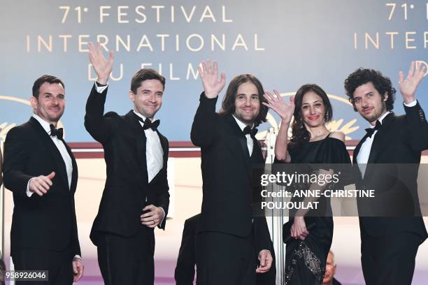 Producer Chris Bender, US actor Topher Grace, US director David Robert Mitchell and his wife Annie Mitchell and US music composer Rich Vreeland pose...