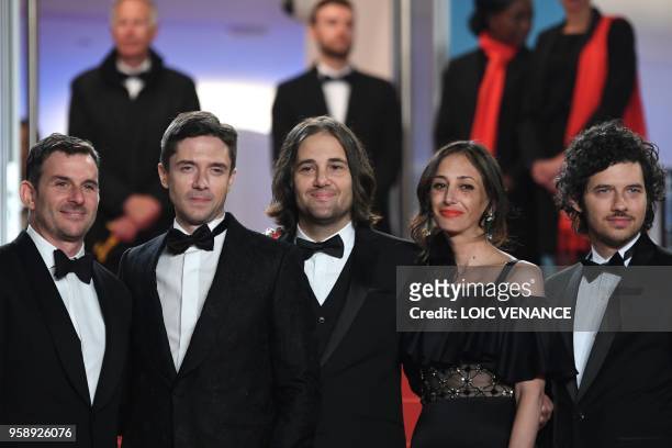 Producer Chris Bender, US actor Topher Grace, US director David Robert Mitchell and his wife Annie Mitchell and US music composer Rich Vreeland pose...