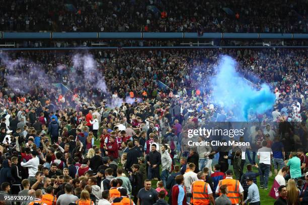 Fans invade the pitch at the full time whistle after the Sky Bet Championship Play Off Semi Final second leg match between Aston Villa and...