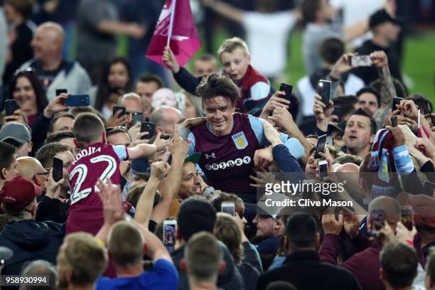 Jack Grealish of Aston Villa is seen at the full time whistle as fans invade the pitch during the Sky Bet Championship Play Off Semi Final second leg...