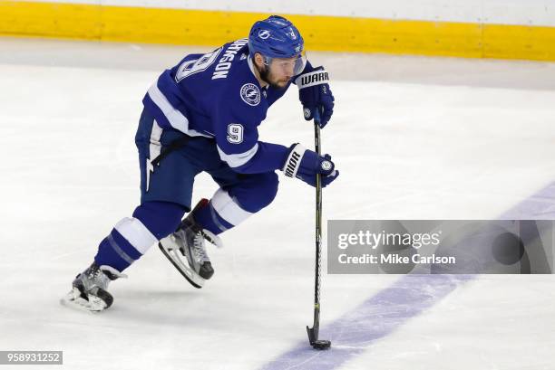 Tyler Johnson of the Tampa Bay Lightning brings the puck up against the Washington Capitals during the first period in Game Two of the Eastern...