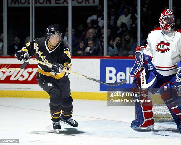 Goaltender Patrick Roy of the Montreal Canadiens guards the net against Jaromir Jagr of the Pittsburgh Penguins in the early 1990's at the Montreal...