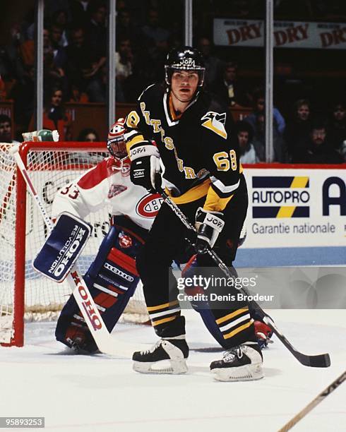 Goaltender Patrick Roy of the Montreal Canadiens protects the net against Jaromir Jagr of the Pittsburgh Penguins in the early 1990's at the Montreal...