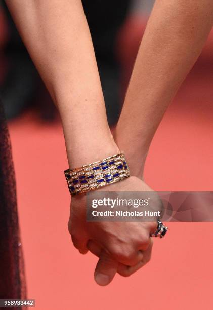 Isabella Ferrari and Jasmine Trinca, fashion detail, attend the screening of "Under The Silver Lake" during the 71st annual Cannes Film Festival at...