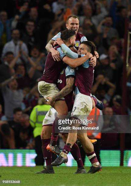 Robert Snodgrass of Aston Villa , Glenn Whelan of Aston Villa and Jack Grealish of Aston Villa celebrate at the full time whistle after the Sky Bet...