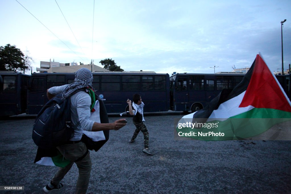 Palestinians demonstrate outside the embassy of Israel in Athens