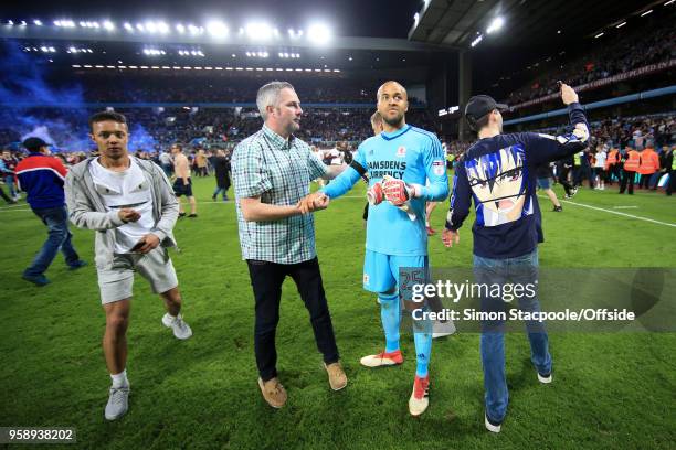 Fans surround dejected Boro goalkeeper Darren Randolph at the end of the Sky Bet Championship Play Off Semi Final Second Leg match between Aston...