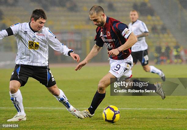 Marco Di vaio of Bologna competes with Leonardo Talamonti of Atalanta during the Serie A match between Bologna and Atalanta at Stadio Renato Dall'Ara...