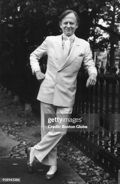 Author Tom Wolfe poses for a portrait outside the Boston Public Garden on Nov. 3, 1987.