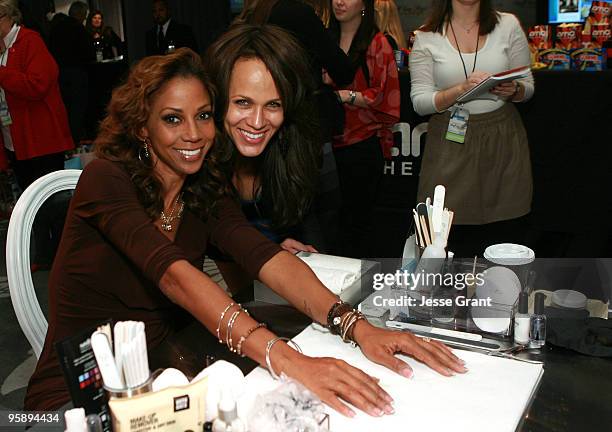 Actresses Holly Robinson Peete and Nicole Ari Parker attend the CVS/Pharmacy Beauty 360 Suite at Access Hollywood "Stuff You Must..." Lounge Produced...