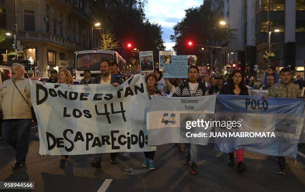 Relatives of crew members of the ARA San Juan submarine, march in Buenos Aires, Argentina, on May 15 six months after it went missing with its 44...