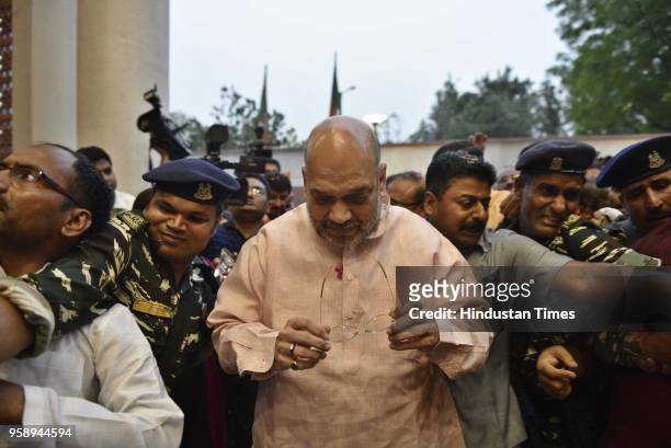 President Amit Shah arrives at the BJP Headquarters after BJP emerged as the single largest party in Karnataka Assembly elections on May 15, 2018 in...