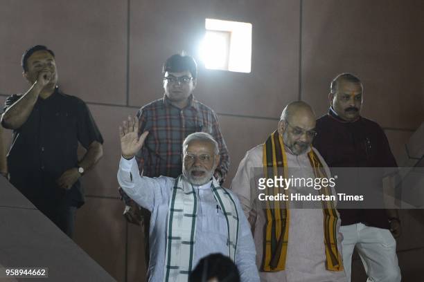 Prime Minister Narendra Modi along with BJP president Amit Shah at the party headquarters after BJP emerged as the single largest party in Karnataka...