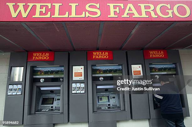 Wells Fargo customer uses an ATM at a Wells Fargo Bank branch office January 20, 2010 in San Francisco, California. Wells Fargo beat analyst...