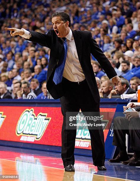 John Calipari the Head Coach of the Kentucky Wildcats gives instructions to his team during the game against the Hartford Hawks at Rupp Arena on...