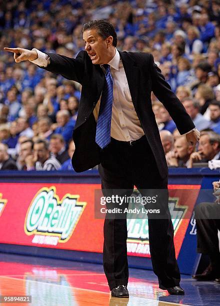 John Calipari the Head Coach of the Kentucky Wildcats gives instructions to his team during the game against the Hartford Hawks at Rupp Arena on...