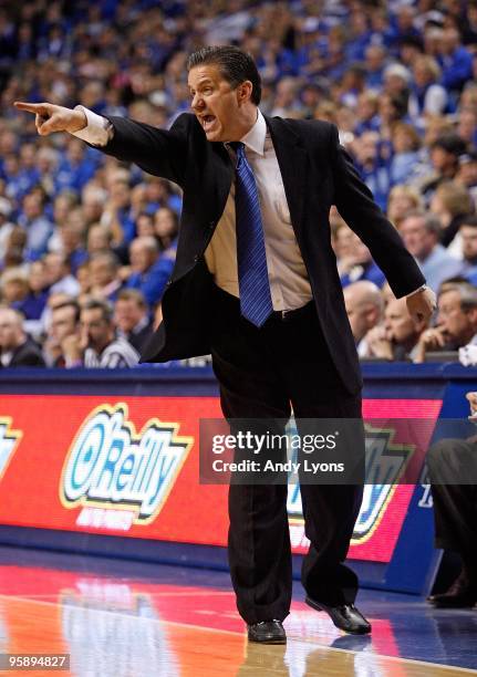 John Calipari the Head Coach of the Kentucky Wildcats gives instructions to his team during the game against the Hartford Hawks at Rupp Arena on...