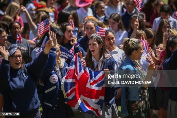 Students at Immaculate Heart High School and Middle school celebrate with US and British flags during a program on May 15, 2018 in Los Angeles to...