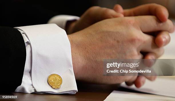 Tareq Salahi wears a 2001 presidential inauguration cufflink while refusing to testify to the House Homeland Security Committee during a hearing on...