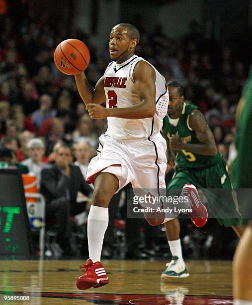 Preston Knowles of the Louisville Cardinals dribbles the ball during the Big East Conference game against the South Florida Bulls on December 30,...