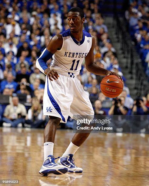 John Wall of the Kentucky Wildcats dribbles the ball during the game against the Hartford Hawks at Rupp Arena on December 29, 2009 in Lexington,...